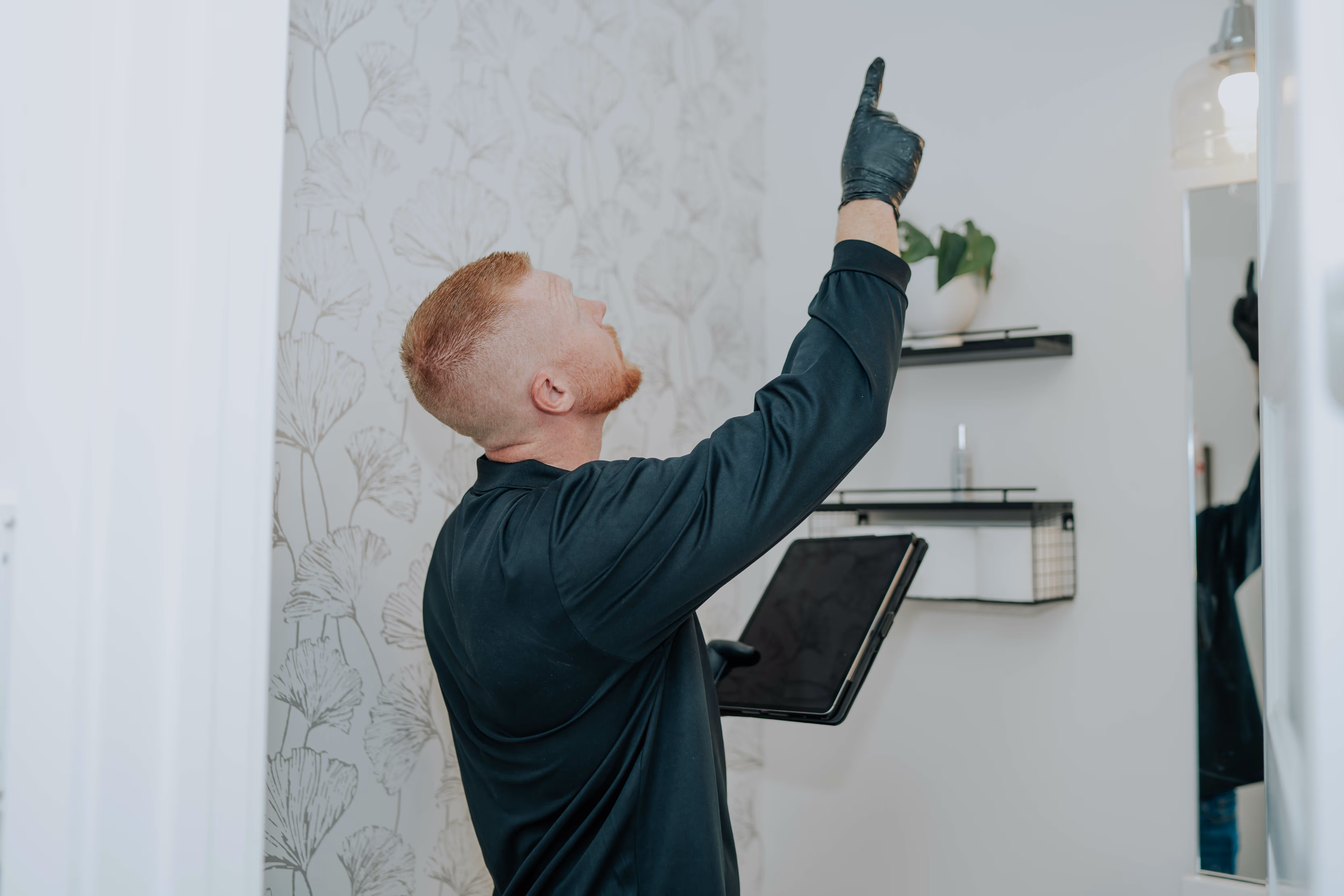 PureAire Technology specialist inspecting a property